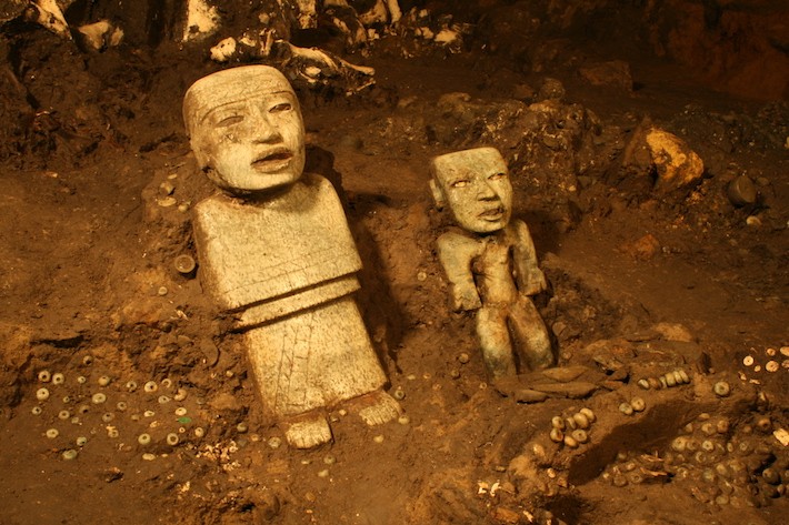 Detail of two standing anthropomorphic sculptures discovered near the terminus of the tunnel beneath the Ciudadela and the Feathered Serpent Pyramid.